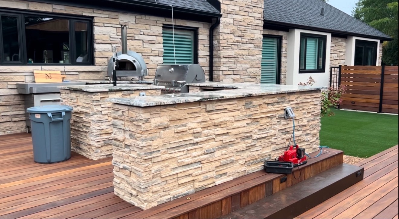 Outdoor stone bar feature at an NS Services project